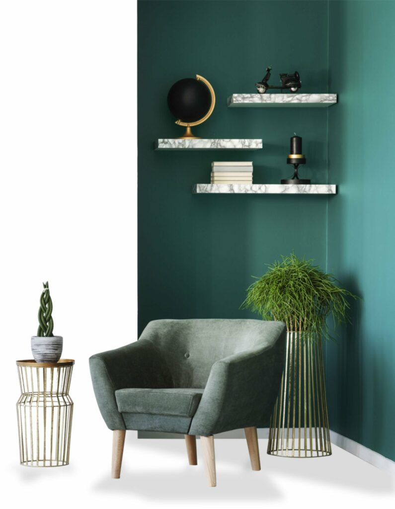A green chair and table in a room.